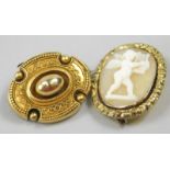 Two brooches, to include a Victorian style brooch, with filigree design border, (AF), and a cameo