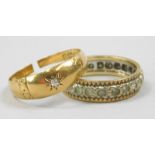 Two rings, to include a 9ct and silver eternity ring, set with white stones, and an 18ct gold signet