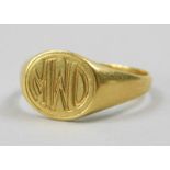 A signet ring, bearing initials MWD, yellow metal, marked 18K, 3.9g all in.