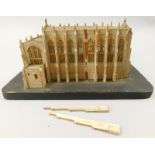 A card scale model of a church, on ebonised base, label to reverse for Messrs. Attwick & Child,