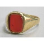 A 9ct gold signet ring, set with orange agate stone, 5.4g all in.