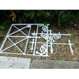 Two sections of Victorian wrought and cast iron balustrade, with gothic style scrolls, drop finials,