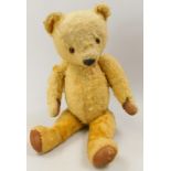A gold mohair teddy bear, 48cm long