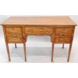 A 19thC mahogany sideboard, the rectangular top above a frieze drawer, flanked by a cellarette