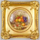 A Royal Worcester porcelain plaque, painted with a basket of fruit and flowers by Richard