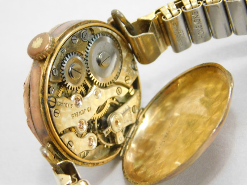 A wristwatch, with a 9ct gold wristwatch head, with gold and silvered coloured dial, and purple - Image 2 of 2