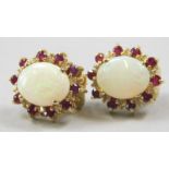A pair of opal cluster earrings, set with rubies and diamonds, yellow metal, marked 585, 6.5g all