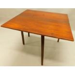 An early 19thC mahogany tea table, the rectangular top with channelled edge on square tapering legs,