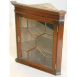 A mahogany corner cabinet, in George III style, with single astragal glazed door, 53cm wide