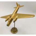 A scale model of a Handley Page Hampden aircraft, in brass and copper, on circular base, 24cm