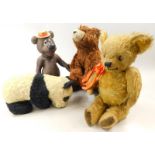 Four various teddy bears, to include a grisly bear by Metti, a plastic bear, a panda, English smiley