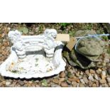 A Victorian cast iron boot scrape, painted white and composition garden frog ornament.