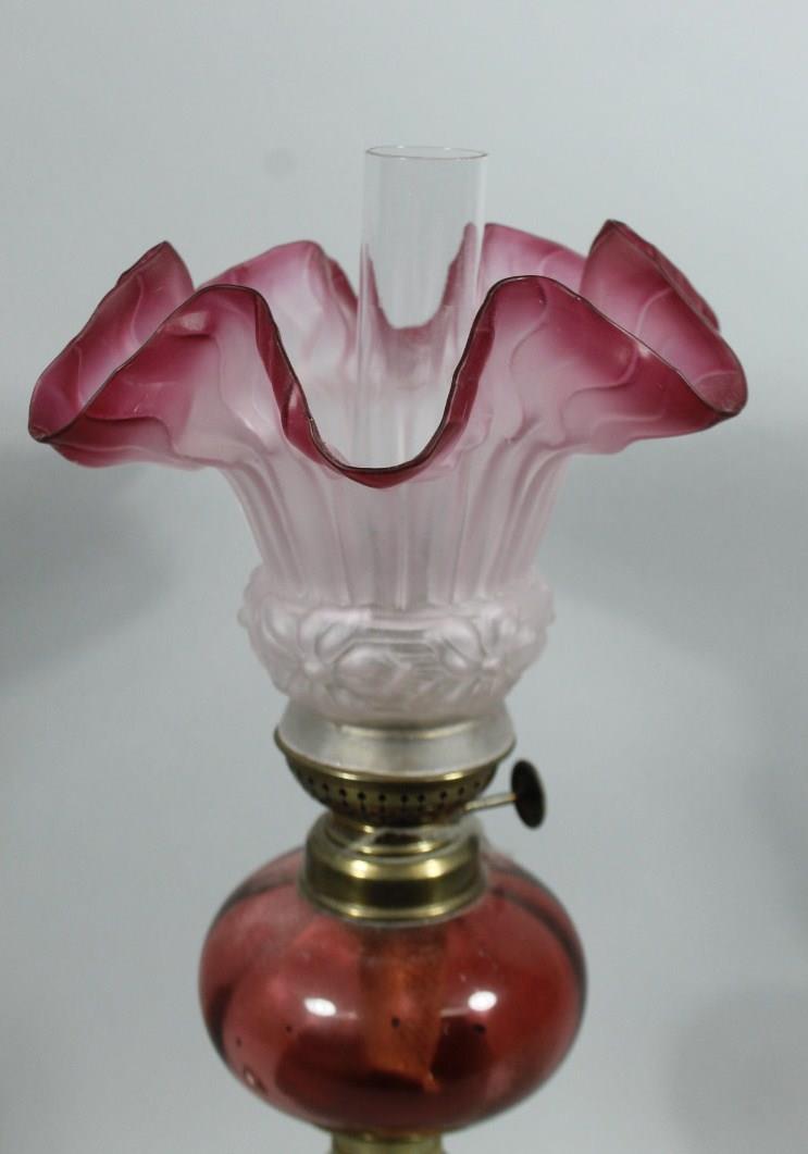 A late 19thC cranberry and brass oil lamp, of small proportion, with clear funnel, frosted clear and - Image 2 of 2