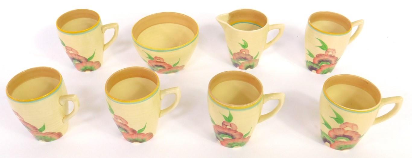 A Clarice Cliff pottery part coffee service decorated in the Pink Pearls pattern, printed marks,