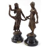 A pair of Art Nouveau design spelter figures, entitled Gaiet & Modiste, each on inverted circular