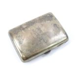 A George V silver cigarette case, with rounded outline, initialled and dated to the exterior,