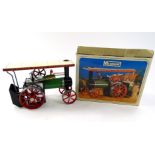 A mid 20thC Mamod steam tractor, 26cm wide. (boxed)