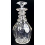 A Georgian cut glass three ring decanter, with a mushroom shaped stopper, 24cm high.