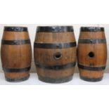 Various coopered barrels, to include a pair and another single with four band section metal banding,