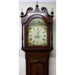 A mid 19thC oak and mahogany country longcase clock, the swan neck pedimented hood housing a 32cm