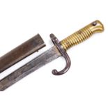 An 1869 pattern bayonet, with turned brass handle, shaped named blade and scabbard, 72cm wide.