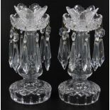 A pair of Waterford Crystal table lustres, each with compressed castellated tops, heavily cut bodies