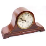 An Edwardian mahogany cased Napoleon hat mantel clock, the 18cm dia. Arabic dial with a keywind