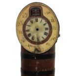 A long case clock formed as a coopered stained oak barrel, of cylindrical form, with added handle