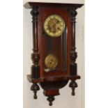 A early 20thC walnut cased Vienna wall clock, of small proportion, the 15cm dia. Roman numeric dial,