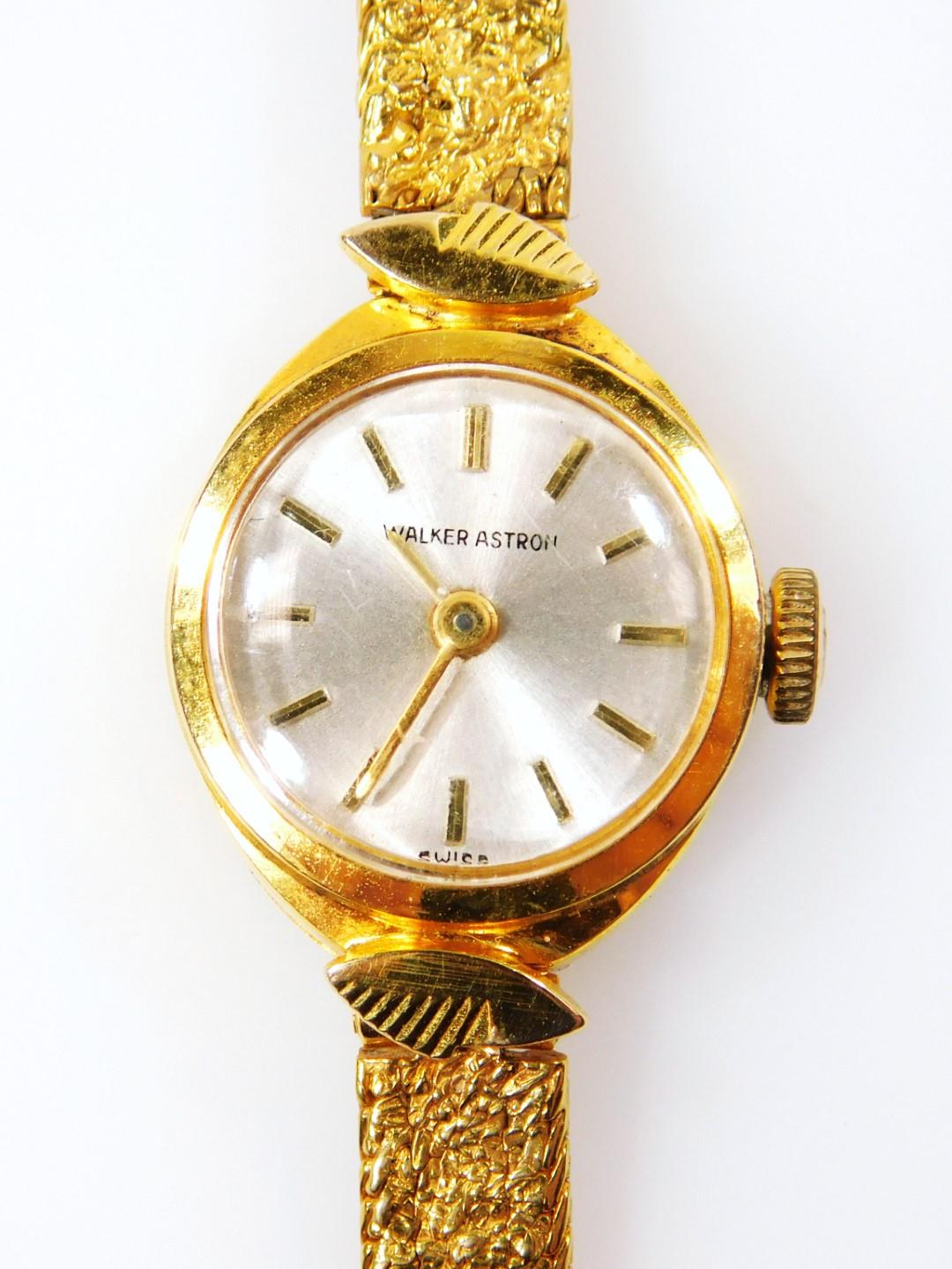 A 9ct gold Walker Astron ladies wristwatch, with small circular silvered dial, on polished design