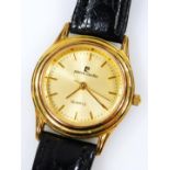 A Pierre Cardin gent's wristwatch, with gold plated watch head, on black leather strap.
