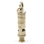 A Metropolitan Hudson & Co military police whistle, with crow's foot mark, of cylindrical outline,