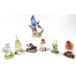 Various Beswick and Aynsley bird figures, to include a matt blue tit, 6cm high, brown headed