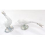 A 20thC Lladro figure of a goose, neck outstretched, printed marks beneath, 9cm high, and a