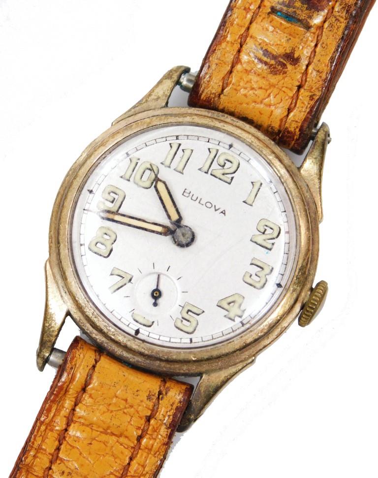 A World War II era gents Bulova wrist watch, with 2.5cm dia., Arabic dial with subsidiary second