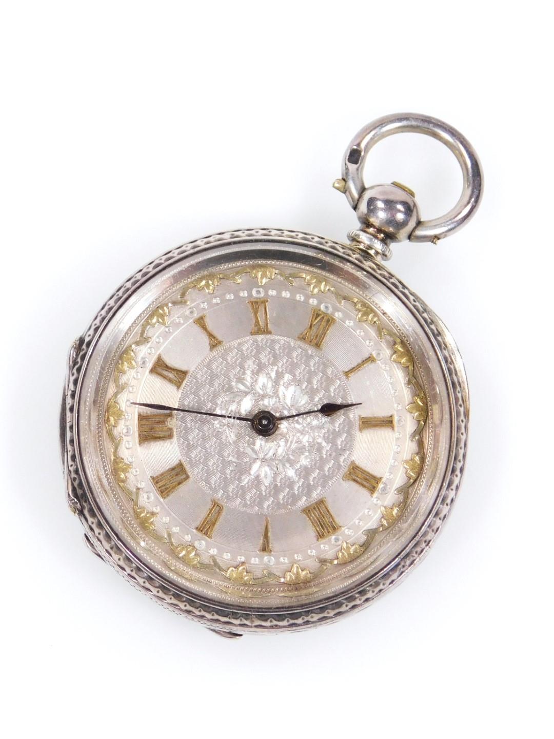 A fancy ladies fob watch, the 4cm dia. Roman numeric dial with stencilled back, in an engine