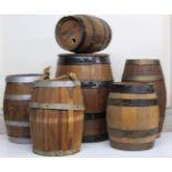 Various oak coopered barrels, to include one with an outer metal banding, 29cm high, etc (a