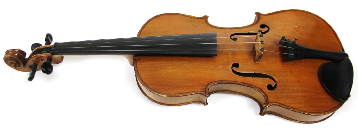 A 20thC pine violin, with two piece polished back, ebonised articulated tuning knops and a scroll - Bild 2 aus 9