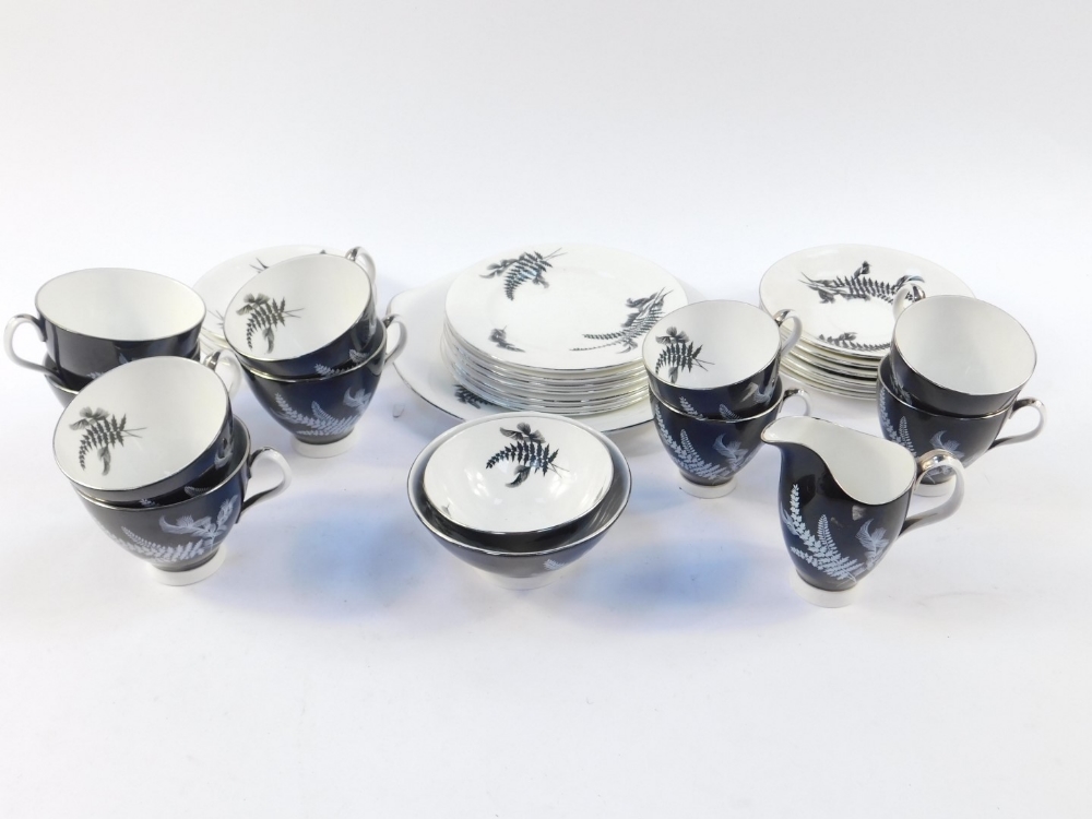 A Royal Albert porcelain part tea and coffee service decorated in the Night and Day pattern,