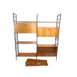 A Staples Ladderax teak three sectional modular unit, with three uprights, two record cabinets,