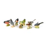 A group of Beswick birds, comprising a Nuthatch, Grey Wagtail (x2), Blue Tit, Stonechat, Wren,