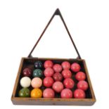 A set of Victorian stained snooker balls, fifteen red, six coloured and one white, together