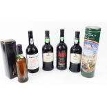 A bottle of Grahams Malvedos 1982 Vintage Port, Delver Ruby Port, two bottles of Noval Fine Ruby