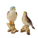 A Beswick pottery figure modelled as a Kestrel, No 2316, together with another modelled as a Song