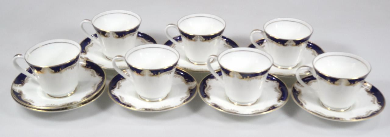 An Aynsley Royal Blue pattern part tea service, comprising seven cups and eight saucers, 14cm