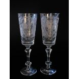 A pair of wine glasses, engraved with the Russian Imperial Coat of Arms, each tapering bowl