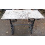 A Victorian style cast iron console table, with a polymer faux marble rectangular top, 79cm H, 107cm