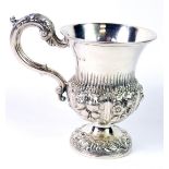 A William IV silver tankard, of baluster form, embossed with panels of flowers and fruit, Benjamin