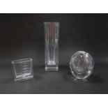 A Kosta clear glass vase, etched mark, 16cm high, an Edenfalk Skruf glass vase, 11cm high, and a