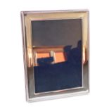 A silver rectangular framed strut photograph frame, with a gadrooned border, London 2000, frame 22.